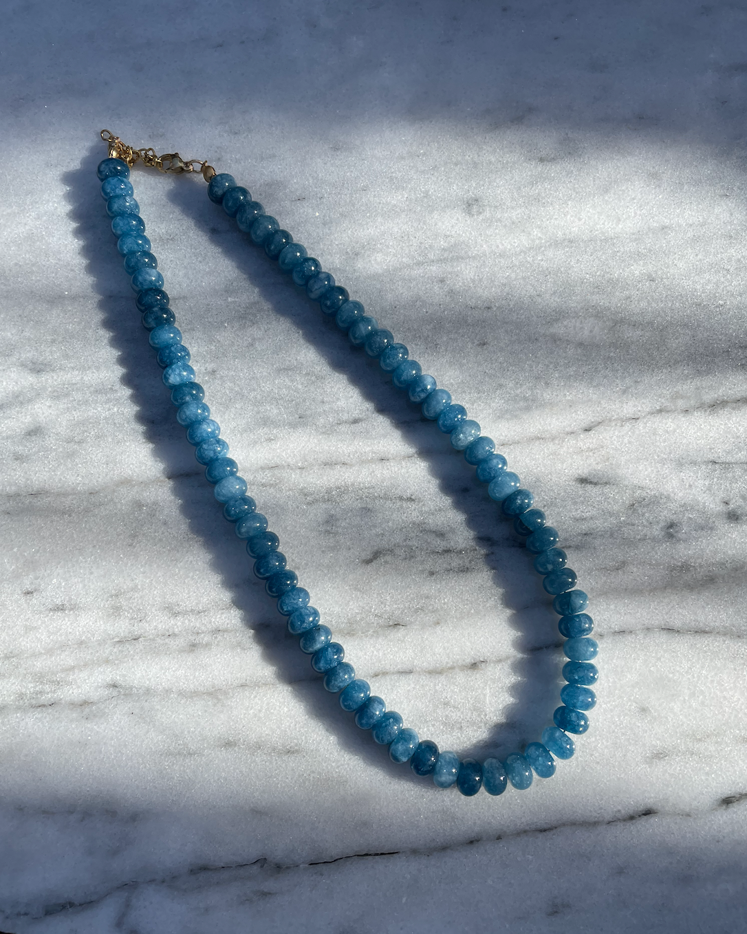 Blue hot sale rock necklace